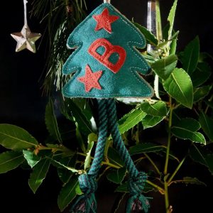 Bruce the spruce hanging in a Christmas tree